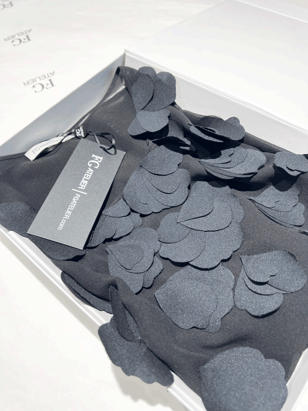Black silk georgette sleeveless blouse with hand-cut silk petals