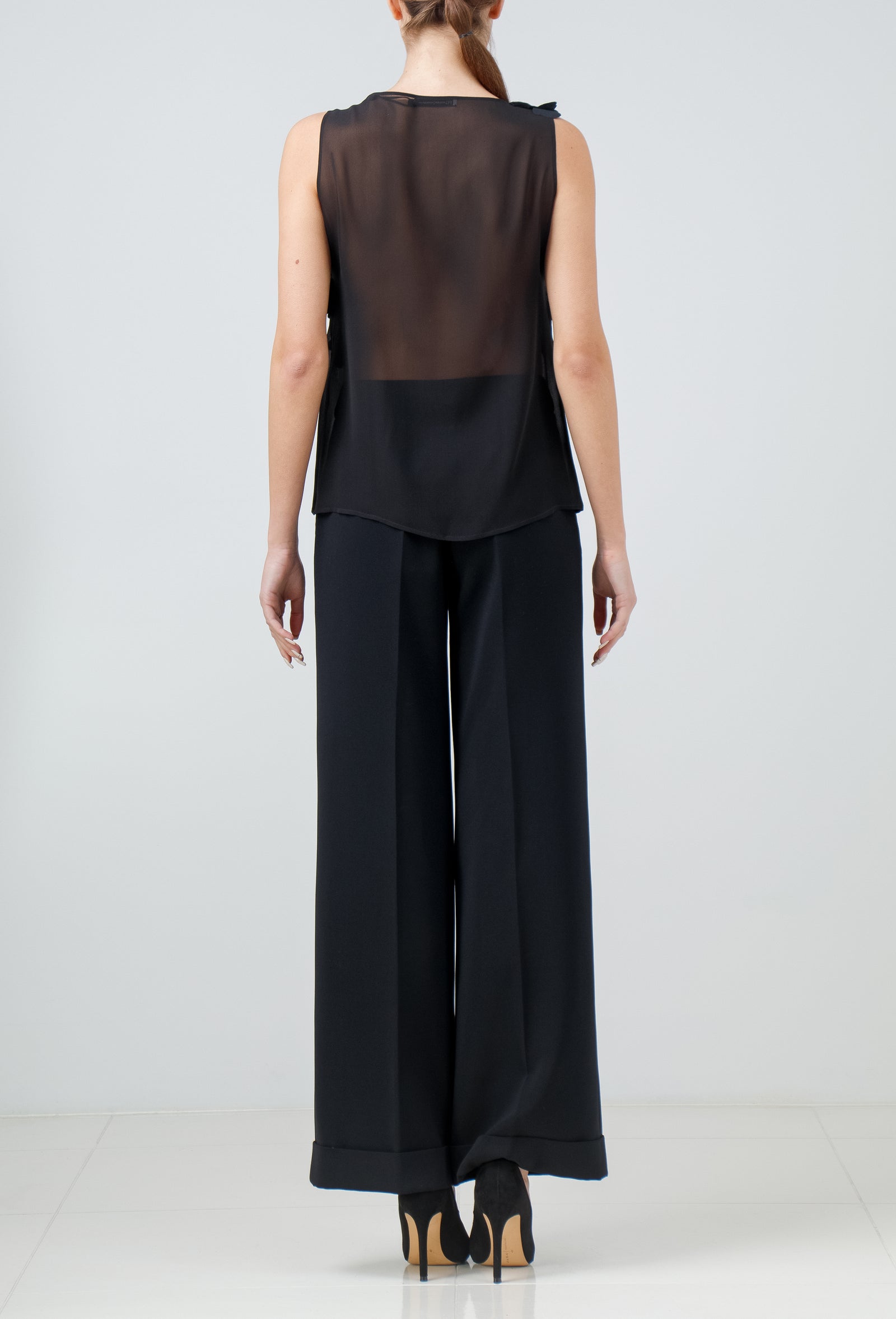 Black silk georgette sleeveless blouse with hand-cut organza petals