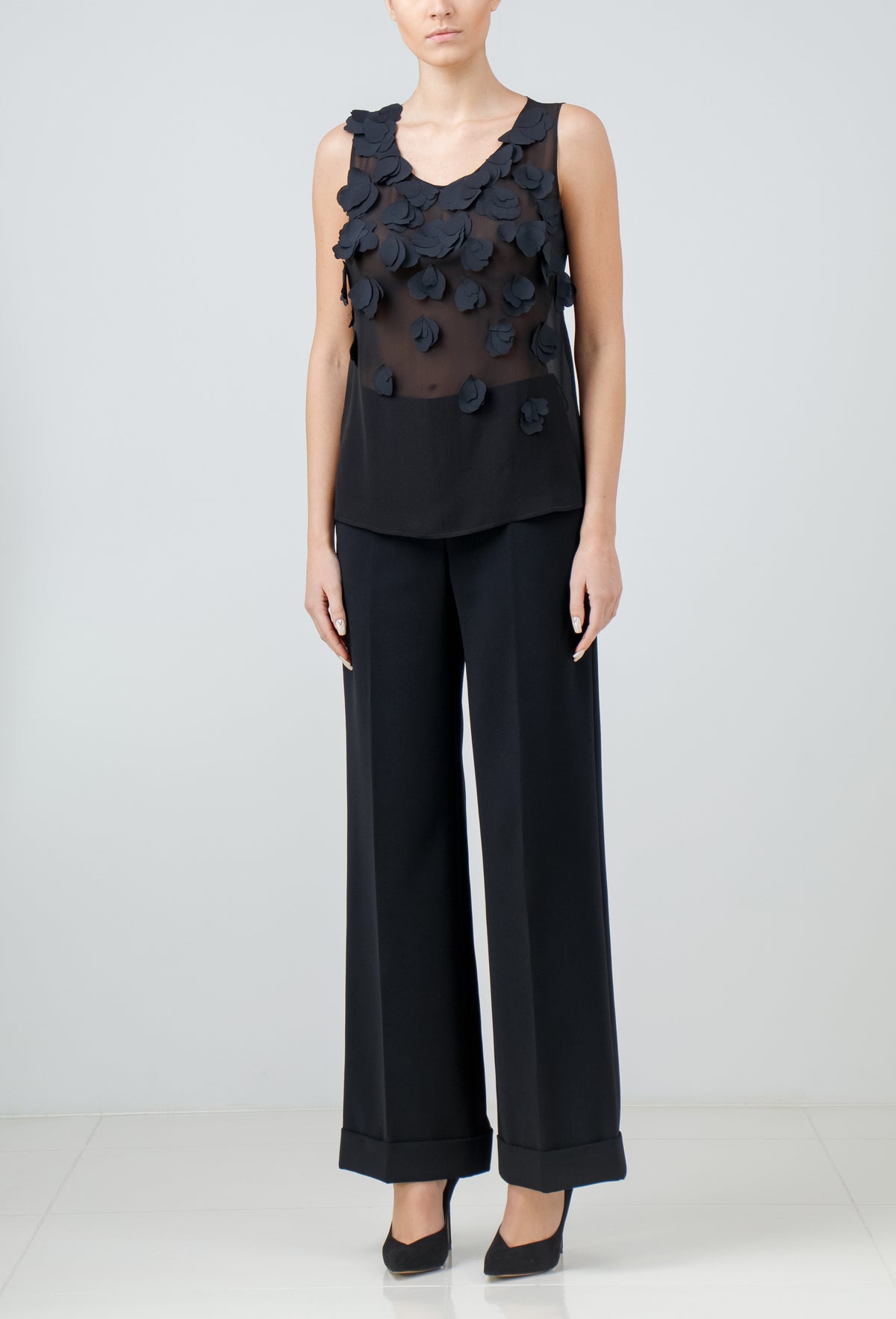 Black silk georgette sleeveless blouse with hand-cut organza petals
