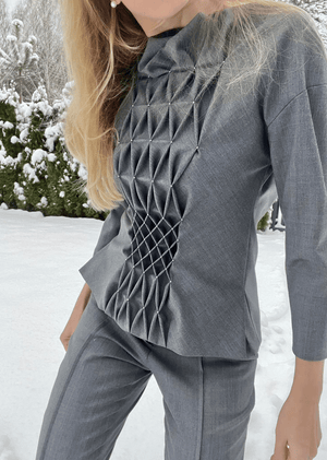Smocked grey wool long sleeve top
