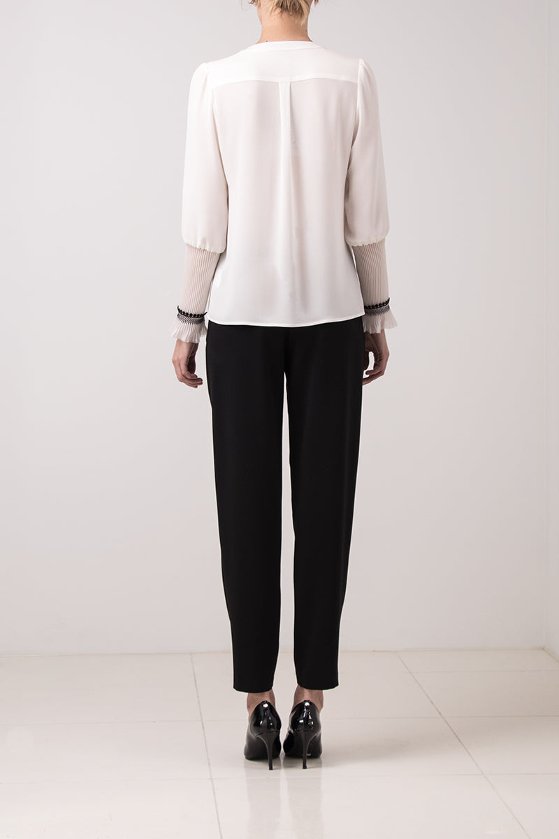 White silk blouse with gathered sleeves