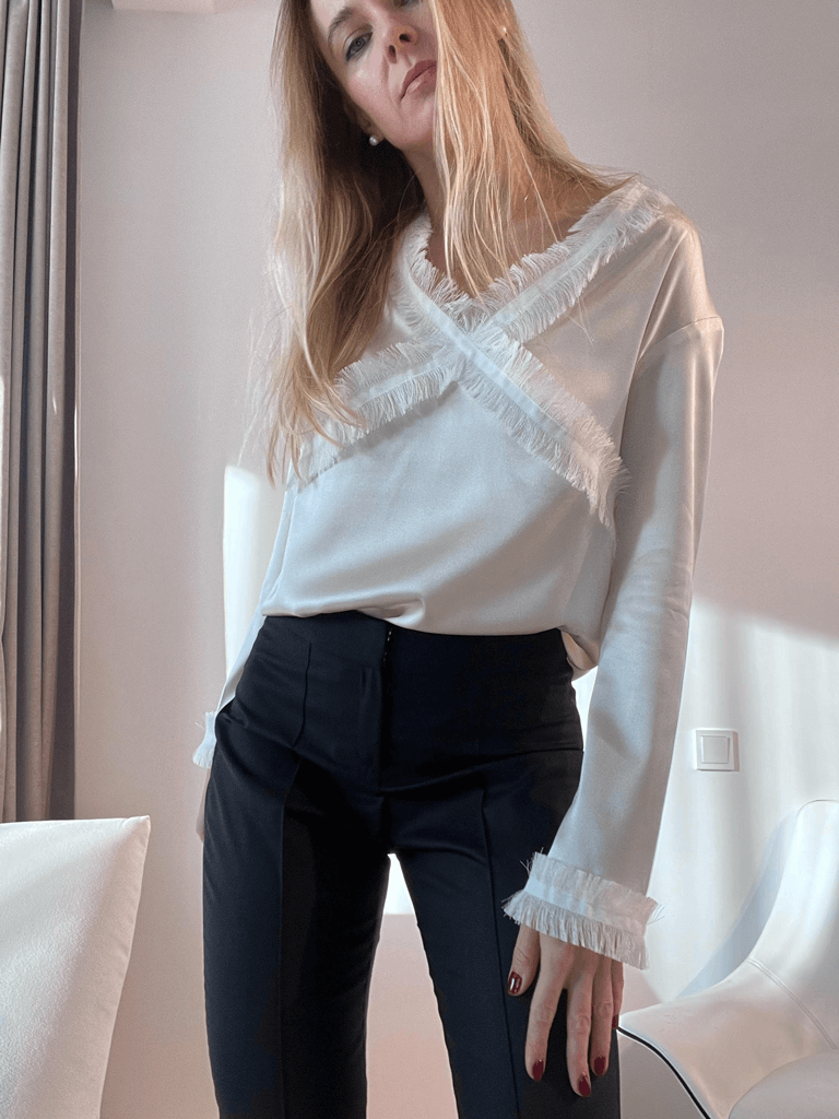White sand stretch silk blouse with fringe detail