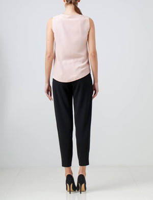Light pink sleeveless asymmetric blouse